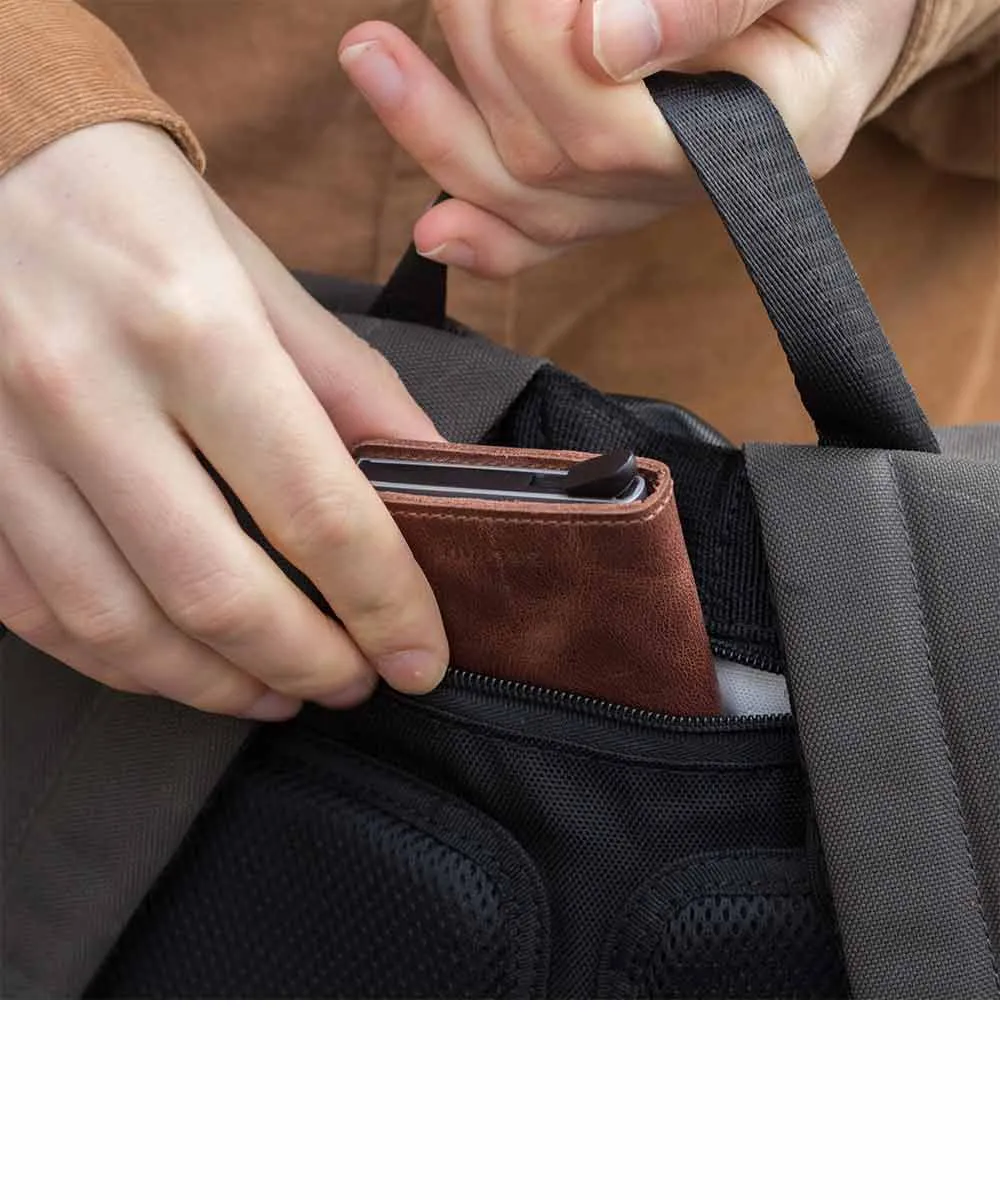Property of Max reflektierender Rolltop-Rucksack