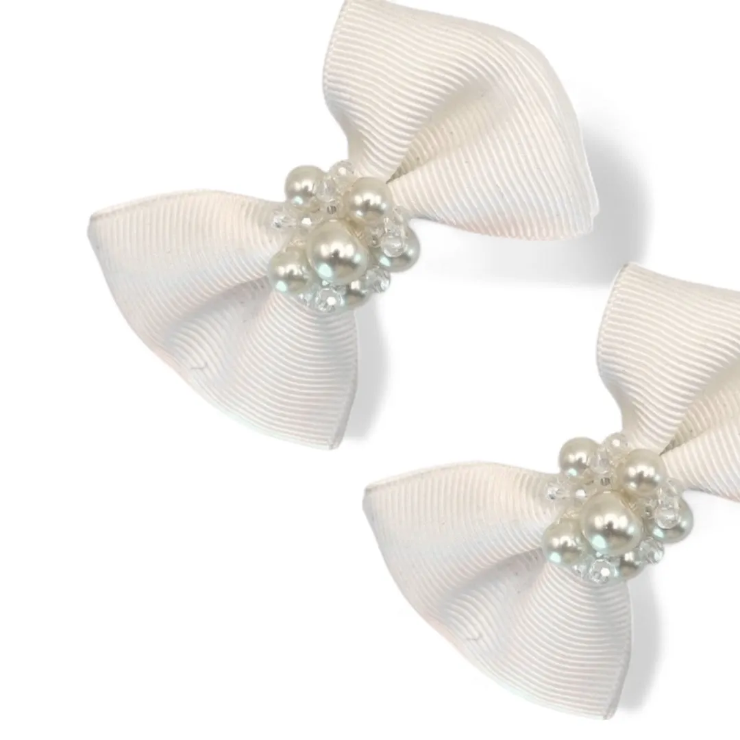 The Aster Childs White Bow Clip Set